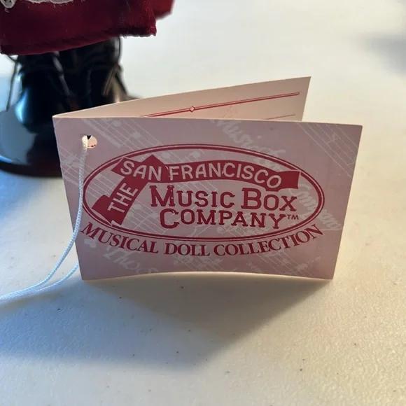 San Francisco Music Box Porcelain Doll Plays Christmas Song Chestnuts Roasting